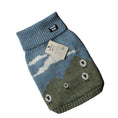 Load image into Gallery viewer, A knit pet sweater in light blue and olive green with a stylized landscape design, featuring sheep and clouds
