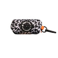 Load image into Gallery viewer, A cylindrical poo bag holder with a black and white flash pattern, featuring a central black circular patch with text. It has a black carabiner attached with an orange loop accent