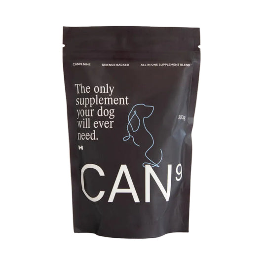 A black stand-up pouch of CAN9 dog supplement with white and light blue text and graphics