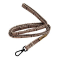 Load image into Gallery viewer, A woven dog leash with a brown, beige, and black textured pattern, featuring a black metal carabiner clip and a small tan brand tag.
