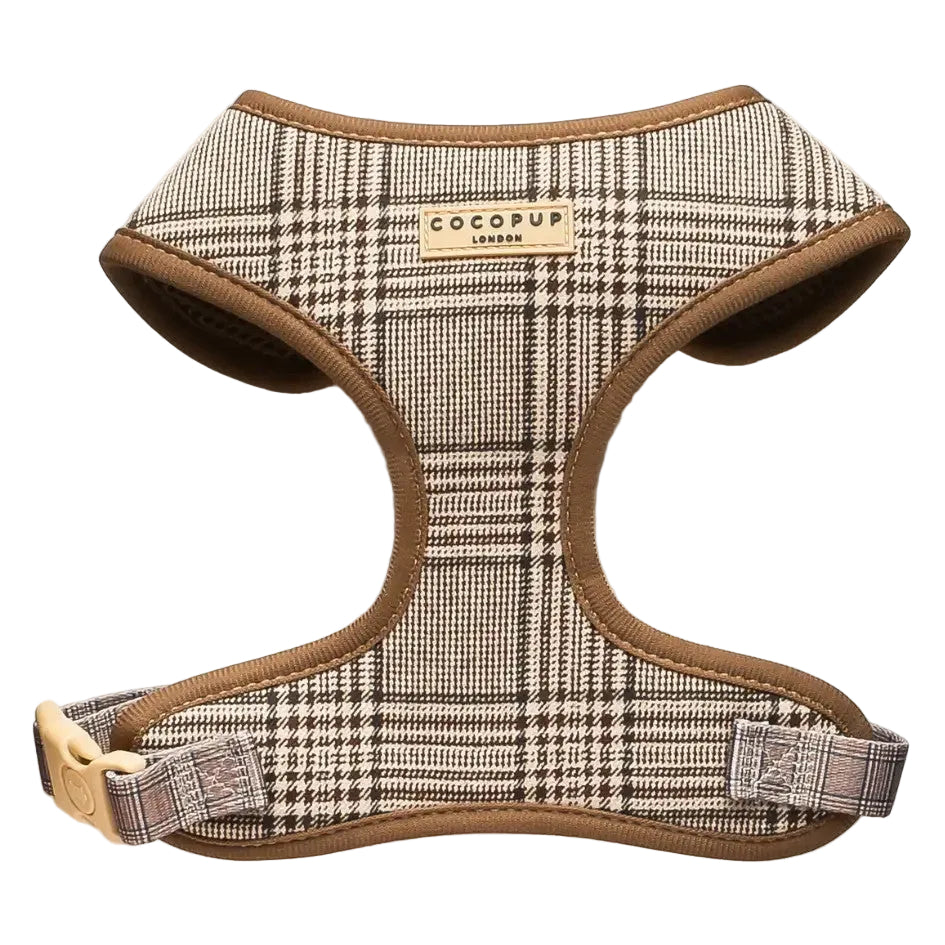 A Cocomup London dog harness in a brown and beige plaid pattern with solid brown trim and a tan plastic buckle