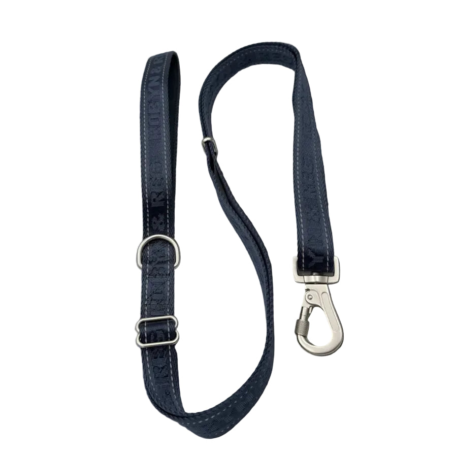 A dark navy blue leather dog leash with silver metal hardware, including a D-ring and a heavy-duty hook clasp, 