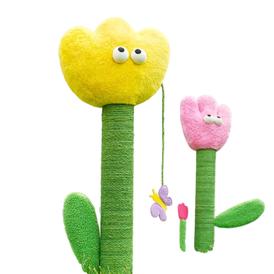 Two plush flower-shaped cat scratching posts on a white background with artificial grass. The larger yellow flower post has a fuzzy yellow bloom, green wrapped stem, green leaves, and a hanging purple butterfly toy.